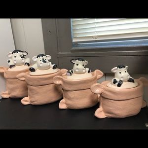 Vintage canisters in burlap bags